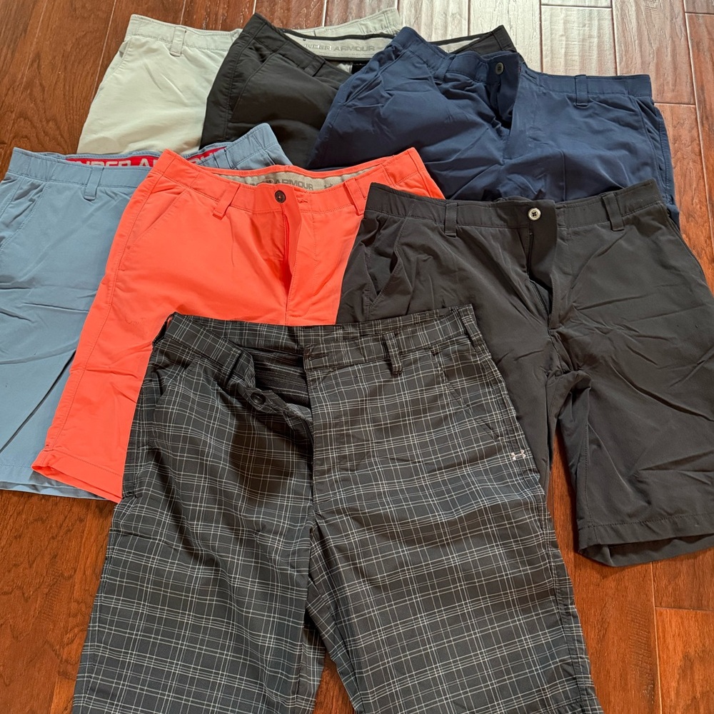Bundle of seven pairs of men’s Under Armour golf shorts.